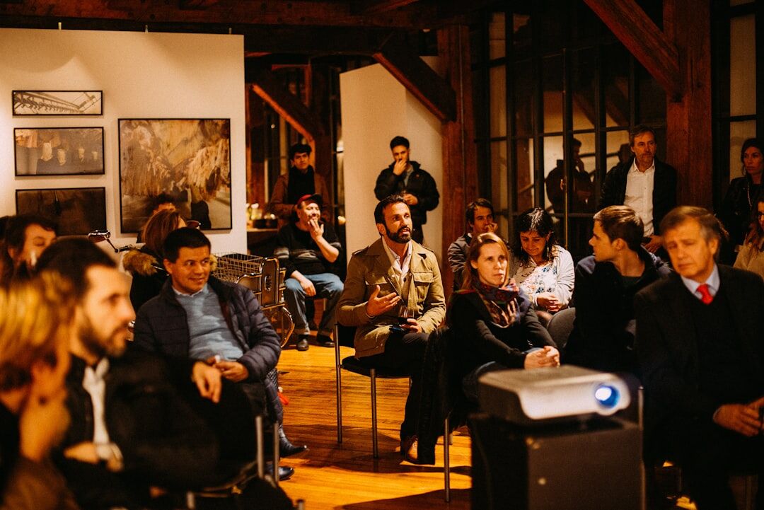 Guests mingling at an evening cultural event in Chile